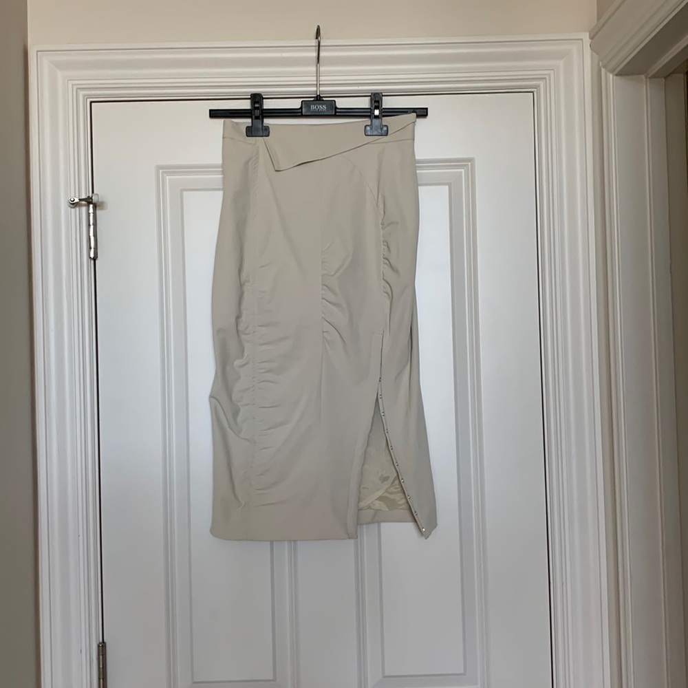 Altuzarra skirt of with front slit hook closures.